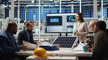 Scientists conduct experiments on PV materials to improve solar panel efficiency. Photovoltaics factory research and development department working on renewable energy solutions, camera A photo