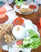 fried rice with chicken and vegetables photo