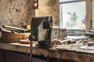Old workshop with vintage hand tools, real life photo, iron photo