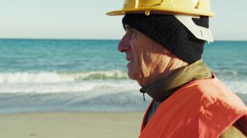 Construction Worker Walking by the Sea in the Morning video