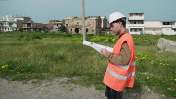 Building Engineer Writing Notes While Working Outdoor video