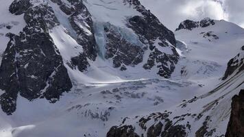 Icy slopes and rugged cliffs of the Caucasus mountain range video