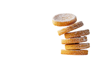 Closeup of a stack of tumbling sugar dusted shortbread cookies with a soft golden glaze The cookies have a delicate crumbly texture and a warm inviting color making them an irresistible treat png