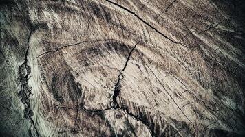 Vintage sepia toned wood texture background. Rustic stop motion animation of timber with natural grain patterns, cracks, and rich earthy tones. Abstract grunge wooden texture. Full HD and looping. video