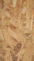 Oriented Strand Board wood texture background. Stop motion animation of OSB engineered wood. Full HD and looping vertical animation. video