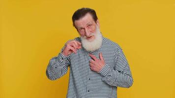 Senior man show a little bit gesture begging help need some more please give me measuring small size video