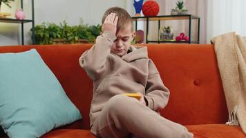Child kid boy use smartphone, playing game loses surprised lottery result fail education study test video