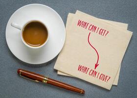 Contribution over consumption concept. Instead of asking, What can I get, the key question becomes, What can I give. photo