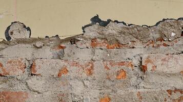 Wall with lining from bits of broken brick. Used as a background. photo
