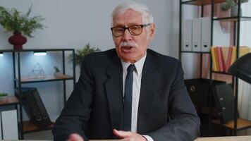 Senior business man director having interview job discussion, conference call at home office video