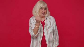 Aggressive angry woman trying to fight at camera, shaking fist, boxing with expression, punishment video