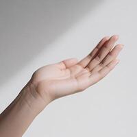 Supporting hand under spotlight photo
