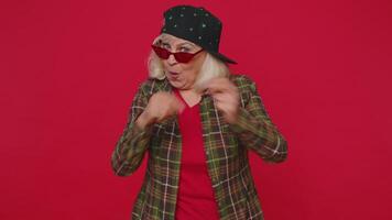 Funny joyful woman making playful silly facial expressions, grimacing, fooling around showing tongue video
