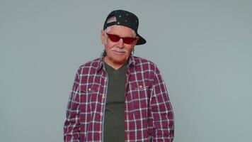 Funny man listening music, smiling dancing to disco party music rhythmically moving hands having fun video