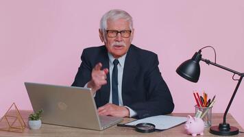 Senior businessman in shakes finger no, be careful, scolding,giving advice to avoid danger mistake video
