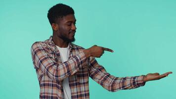 Man pointing empty place, advertising area for commercial text, copy space for goods promotion video