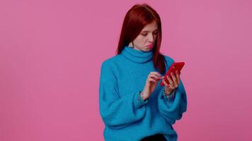 Girl using mobile phone typing new post on web, sms message, browsing, addiction of social networks video