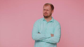 Dissatisfied man shaking head no, expressing irritation feeling bored disappointed results, bad news video