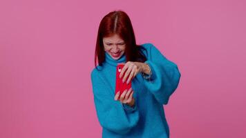 Worried funny addicted woman girl enthusiastically playing drive racing games on mobile phone video