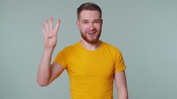 Countdown to holiday birthday celebration, happy man counting in reverse order from five to one, win video