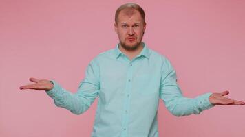 Man raising hands in indignant expression asking why what reason of failure demonstrating disbelief video