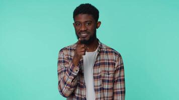 Displeased african american man gesturing with irritation, blaming scolding for failure asking why video