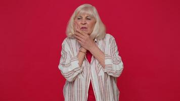 Woman touching cheek suffering from toothache cavities or gingivitis waiting for dentist appointment video