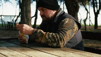 Man Eating And Relaxing In The Woods video