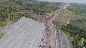 Aerial View of Landscaping Project with Infrastructure Development Surrounded by Lush Greenery and Farmland video