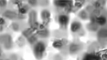 Abstract grayscale image, displaying a mesmerizing blend of blurred shapes and textures, creating a dreamy and ethereal effect. video