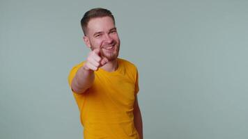 Man pointing finger to camera, laughing out loud, making fun of ridiculous appearance, funny joke video