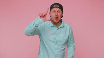 Man showing loser gesture, blaming accusing for unsuccess, disrespect bullying abuse, failure, shame video