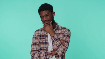 Smiling playful happy man blinking eye, looking at camera with toothy smile, winking and flirting video