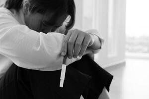 Depression and mental illness, Asian woman stressed from premarital pregnancy. Stressed girl confused with unhappy problems, arguing with boyfriend, single mother, social problems, disappointed photo