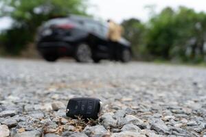 keys on the ground, Car keys dropped on the floor or fall lying on the street home front. Walking Away From Lost Car Key, can not transport, express, rush time, wast time, emergency photo