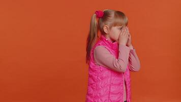 Toddler girl smiling friendly at camera and waving hands gesturing hello or goodbye, welcoming. video