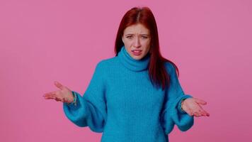 Girl raising hands in indignant expression asking why what reason of failure demonstrating disbelief. video