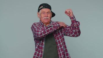Man showing biceps and looking confident, feeling power strength to fight for rights, success win. video