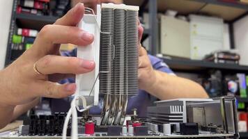 Computer processor repair in an electronics repair lab using troubleshooting and maintenance tools and components video