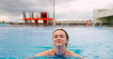 Charming Woman Swimming In Pool With Thermal Water In Summer Day, Portrait Of Pretty Lady Relaxing video