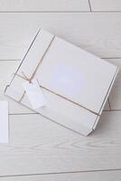 Box with space for advertisement delivered from online store. Internet shopping and delivery concept. Mockup photo