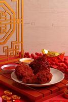 a plate of food on a table with a chinese symbol on it photo