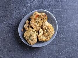 a plate with some chicken on it photo