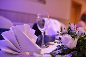 Elegant Dining Table Setting with Floral Centerpiece photo