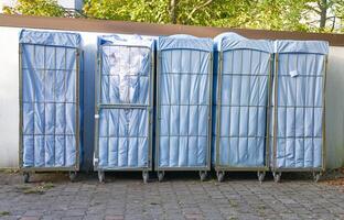 Five Covered Carts from a hotel on Wheels in Outdoor Setting photo