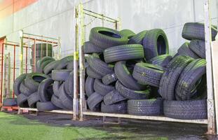 Stack of Used Tires in Storage photo