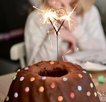 Festive Chocolate Cake with Heart Sparkler photo