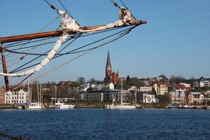 Harbor View with Ship and Church Spire photo