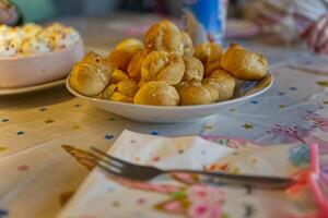 Delicious Cream Puffs on a Festive Table photo