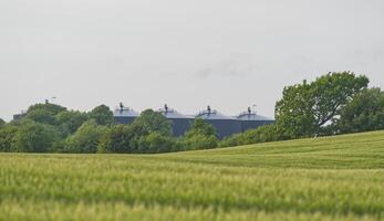 Distance view of the BIO Gas storage facility at the biogas site in Kvaers in Denmark photo